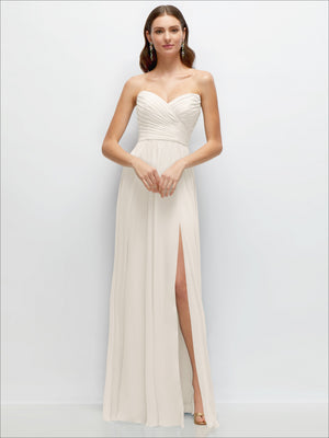 Ivory strapless pleated chiffon maxi dress with gathered bodice and thigh-high slit