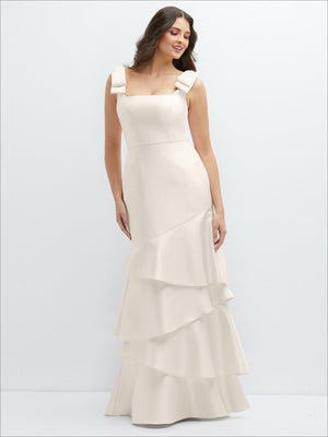 Satin maxi dress with bow shoulders and asymmetrical tiered skirt, white