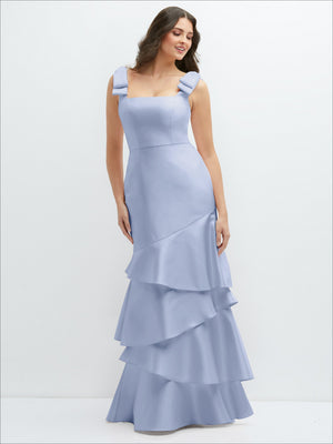 Bow-shoulder satin maxi dress in light blue with tiered asymmetrical ruffle skirt