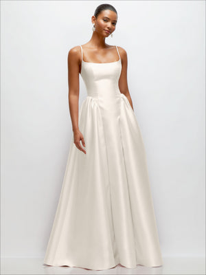 Ivory satin maxi dress with thin spaghetti straps, scoop neckline, and gathered waist