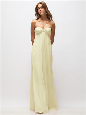 Empire-waist chiffon halter maxi dress in pale yellow with tied halter neckline and straps