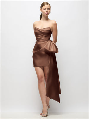 Strapless satin mini dress in cocoa brown with pleated drape and long tail bow detail
