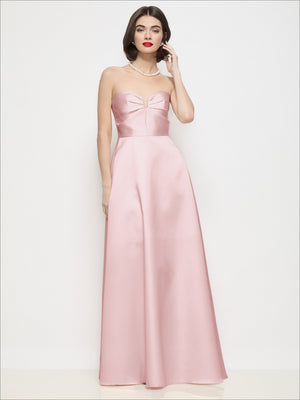 Pink satin strapless maxi dress with center-bow bodice and smooth A-line skirt