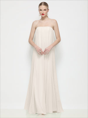 Ivory strapless shirred chiffon maxi dress with strapless neckline and gathered chiffon skirt