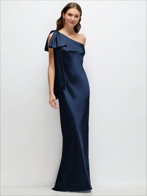 One-shoulder bias-cut satin maxi dress in midnight navy with cascading shoulder bow