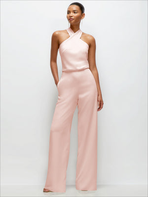 Blush halter crepe wedding jumpsuit with wide-leg pants and sleeveless high neckline