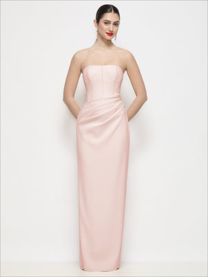 Powder pink strapless corset maxi dress with asymmetrical drop waist and column skirt