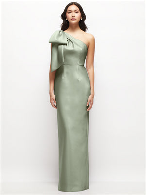 Sage green satin one-shoulder column maxi dress with oversized draped bow at neckline