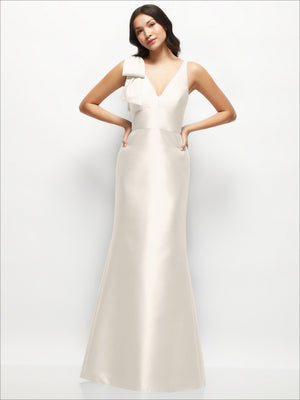 Ivory satin trumpet dress with one-shoulder bow neckline, deep V front