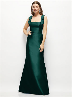 Deep green satin fit-and-flare maxi dress with shoulder bows and square neckline