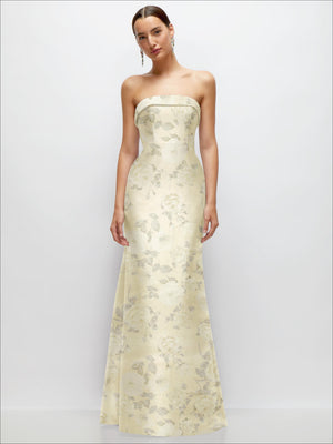 Butter yellow strapless satin trumpet gown with subtle light floral print