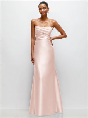 Blush pink strapless satin trumpet gown with draped bodice and fitted skirt.