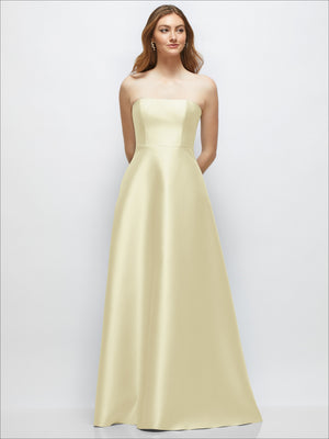 Ivory strapless satin gown with fitted bodice and full skirt; covered buttons at back
