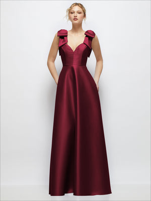 Burgundy satin ball gown with deep V-neck and bow-shoulder details