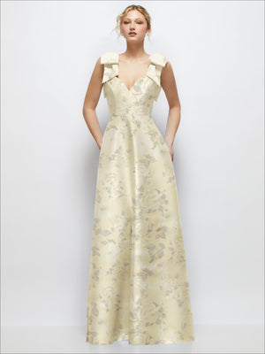 Cream satin ball gown with deep V-neck, floral print, and shoulder bow straps