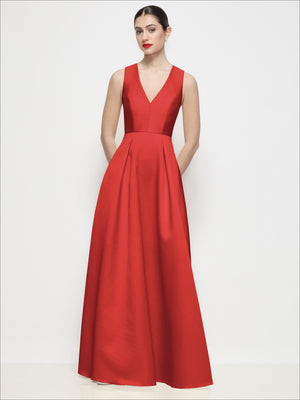 Red sleeveless V-neck satin maxi dress with pleated A-line skirt