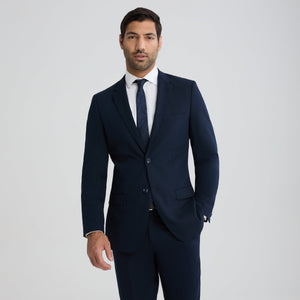 Men's navy suit jacket with notch lapels, two-button front, and front pockets