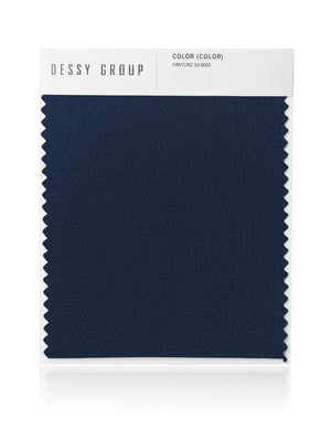 Crepe fabric swatch in dark navy blue with zigzag edge trim