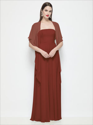 Chiffon flounce cape with draped front overlay, warm rust-burgundy red, short sleeves.